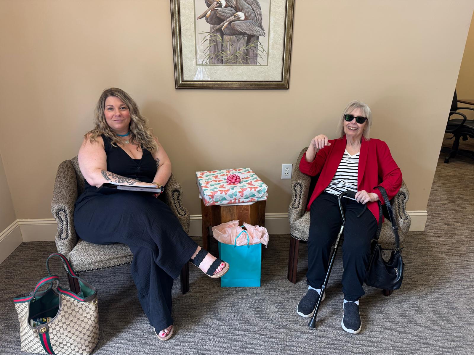 Jeannie Alvear with client closing day gift