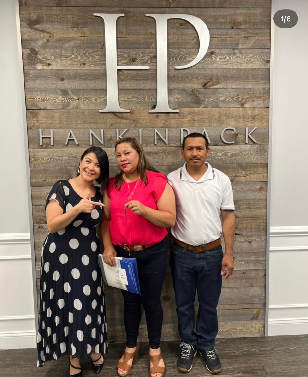Sandy Alvear with clients at Hankin Pack attorneys closing
