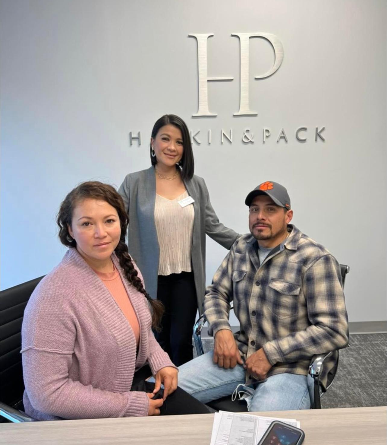 Sandy Alvear clients closing at law office